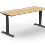 Boost Crank desk with oak top and black frame.