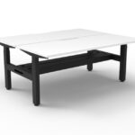 Boost Crank workstation with white top and black frame.