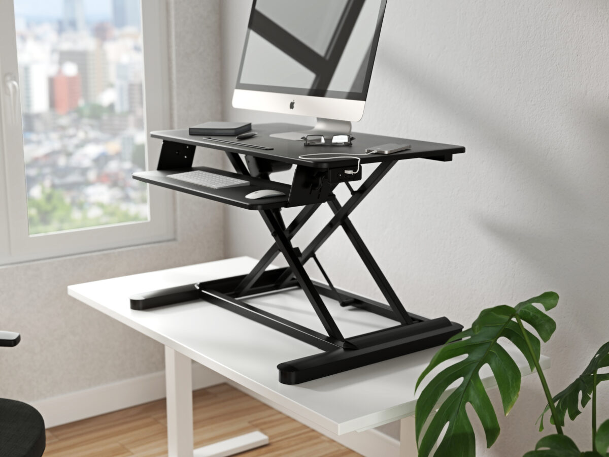 MaxiShift Lite desk riser in its natural habitat.