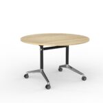 Modulus round flip table with black frame and new oak melamine top.